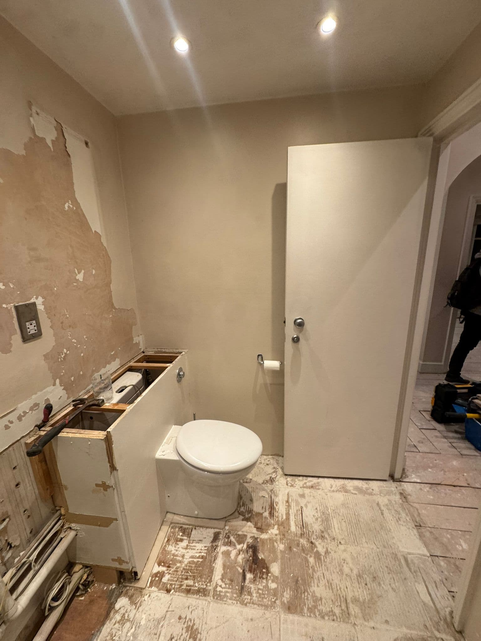 Bathroom mid-strip-out prior to renovation works, London
